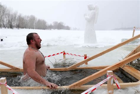 Russians Take A Frozen Dip To Celebrate Epiphany The Moscow Times