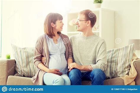 Happy Pregnant Wife With Husband At Home Stock Photo Image Of