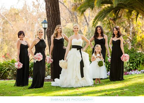 Bride Posing With Bridesmaids And Flower Girl Riviera Country Club