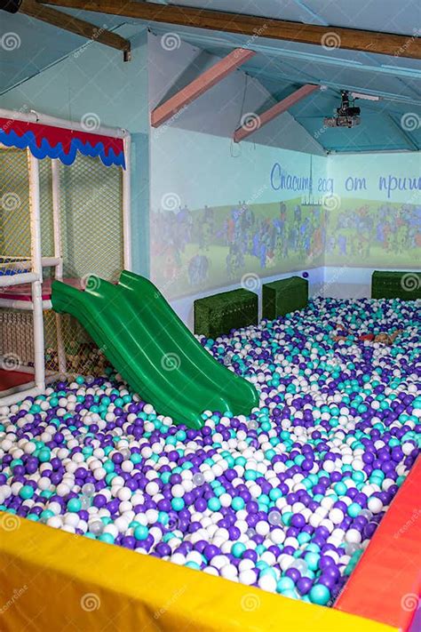 Children S Slide In Balls On The Playground Stock Photo Image Of