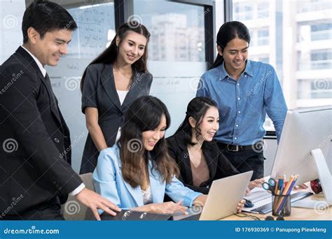 A Group Of Business People Working Together Stock Image Image Of