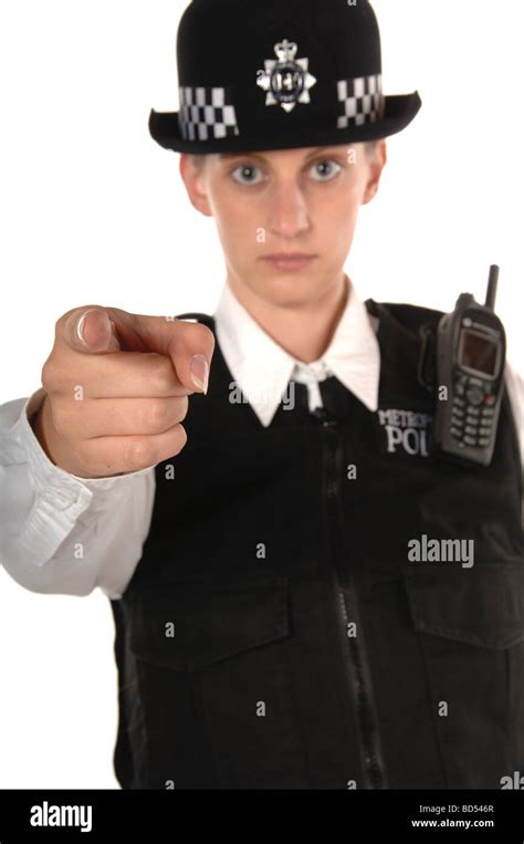 Uniformed Uk Female Police Officer Pointing An Accusing Finger Isolated