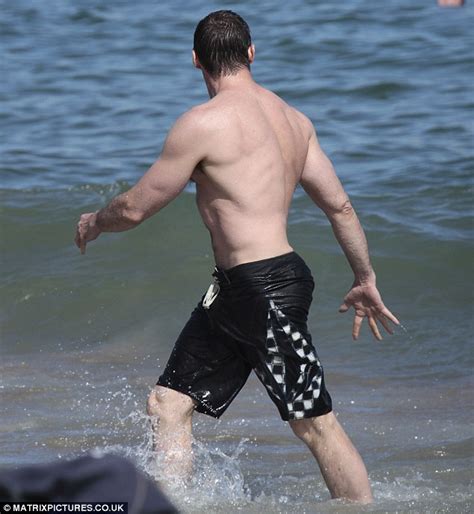 Hugh Jackman Showcases Bulging Muscles In The Waves Daily Mail Online