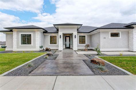This Modern Stucco Home Is Absolutely Stunning White Stone Accents