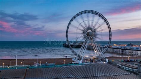 The Victorian Brighton Pier And The Brighton Wheel After Sunset