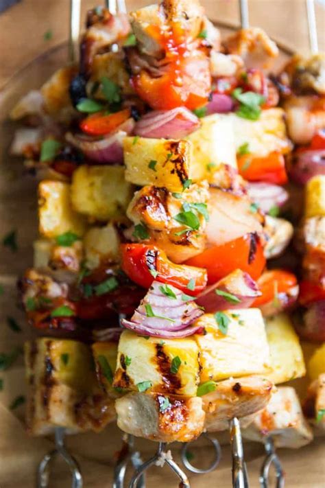 A light marinade of soy sauce, brown sugar, and sherry with sesame and spices tenderizes these chicken pineapple kabobs into an aloha grilled dream of a dish! These pineapple chicken kabobs have a spicy sweet bbq ...