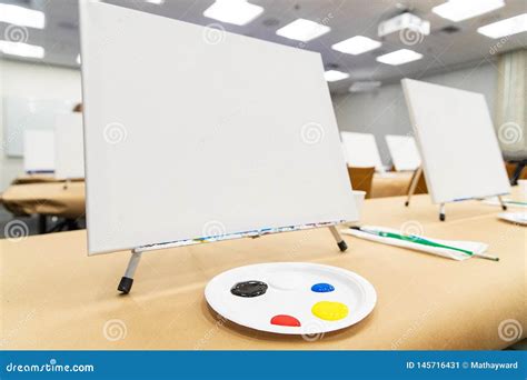 Multiple Blank Canvas With Paint Setup For Art Class Stock Image