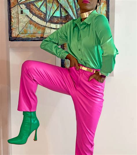 Wearing A Green Satin Top With Pink Faux Leather Pants Avenuesixty