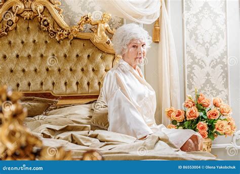 Lonely Rich Senior Lady In Bedroom Stock Photo Image Of Furniture