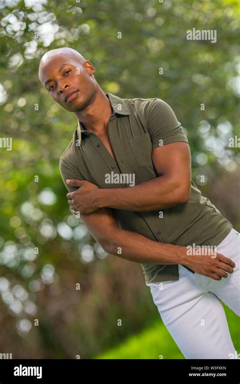 Portrait Of A Young African American Man In A Tough Guy Pose With Arm