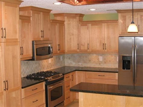 It also has a tiled backsplash when paired with maple kitchen cabinets, this tone can create a bright warm, and inviting look. Image result for kitchens with maple cherry cabinets | Maple kitchen, Maple kitchen cabinets