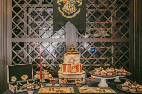 A Harry Potter Themed Dessert Table With Cupcakes