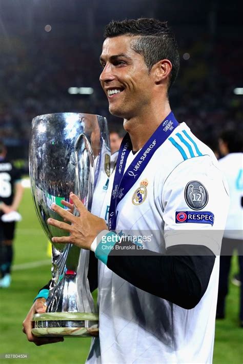Cristiano Ronaldo Of Real Madrid With The Trophy After The Uefa Super