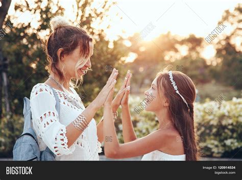Tween Daughter Holding Image And Photo Free Trial Bigstock