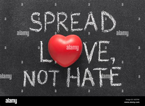 Spread Love Not Hate Phrase Handwritten On Blackboard With Heart Symbol Instead Of O Stock