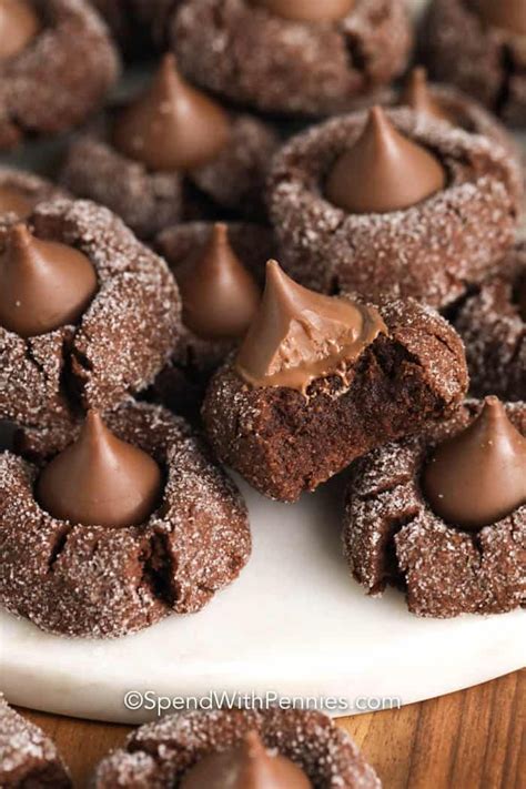 Chocolate Packed Hershey Kiss Cookies Are Rolled In Sugar And Baked With