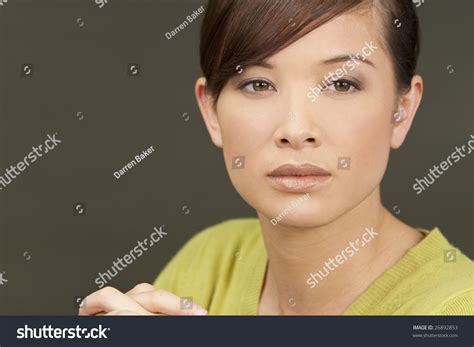Studio Shot Of Beautiful Young Oriental Woman With A Wonderful