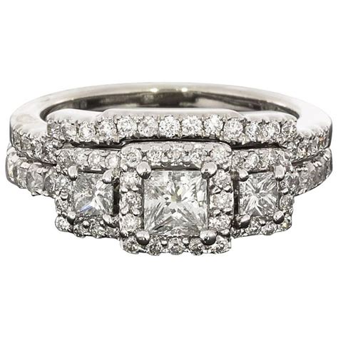 The band, or shank, of your engagement ring is just one component of the design. Princess Cut Diamond Three-Stone Halo Engagement Ring ...