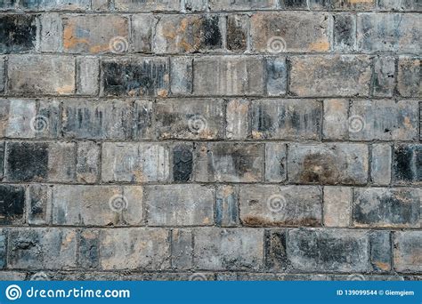 Background Of Old Vintage Black And Gray Dirty Brick Wall Texture Stock