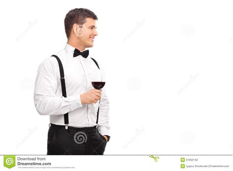 You'll find that your other fingers will just rest on the base naturally. Cheerful Young Man Holding A Glass Of Red Wine Stock Photo - Image of cheerful, clothes: 51362142