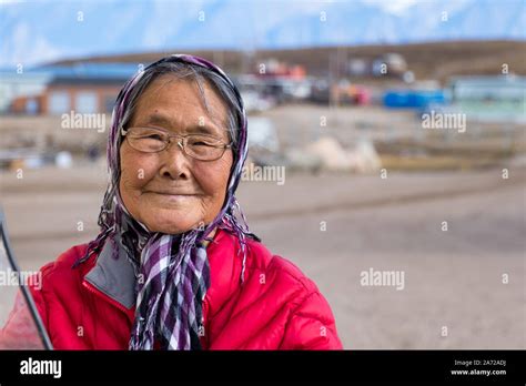 Portrait Of A Eskimo Inuit Senior Woman Outdoors In Pond Inlet