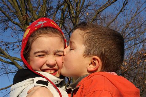 Boy Kissing A Girl Stock Photo Image Of Young Cheerful 23090262