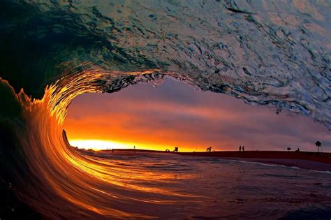 Pictured Photographer Captures Stunning Images Of Sunsets Surfers And