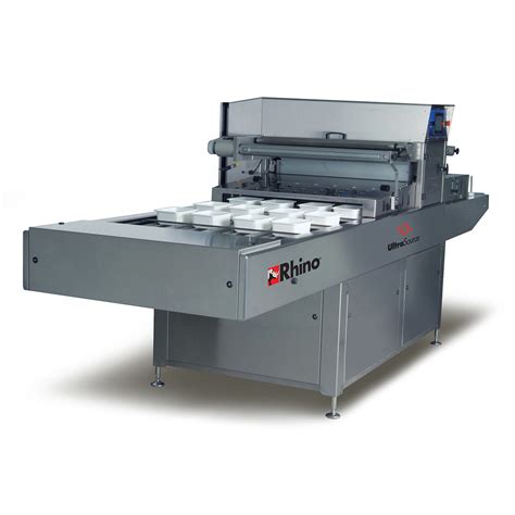 The equipment is easily adjustable by maintenance or production line employees for varying tray sizes. Rhino 12 Automatic Food Tray Sealing Machine with optional ...