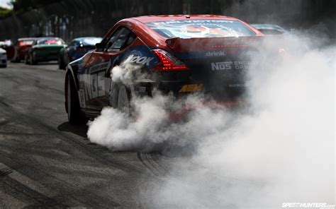 Nissan 370z Burnout Smoke Race Competition Hd Wallpaper Cars