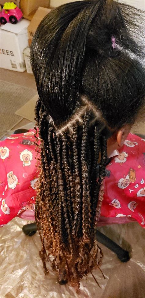 I don't have step by step pictures on this, but this hairdo is one that certainly isn't rocket science. Pin on rubber band box braids
