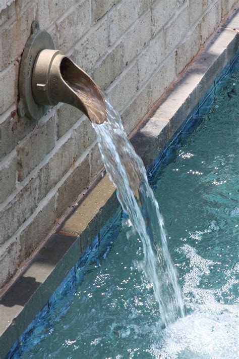 One Of The Coolest Spouts Weve Put In A Pool Pool Water Features
