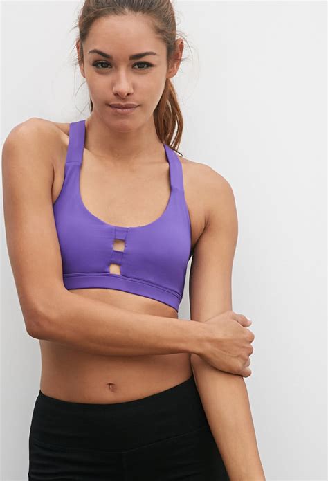 Lyst Forever 21 Medium Impact Caged Back Sports Bra In Purple