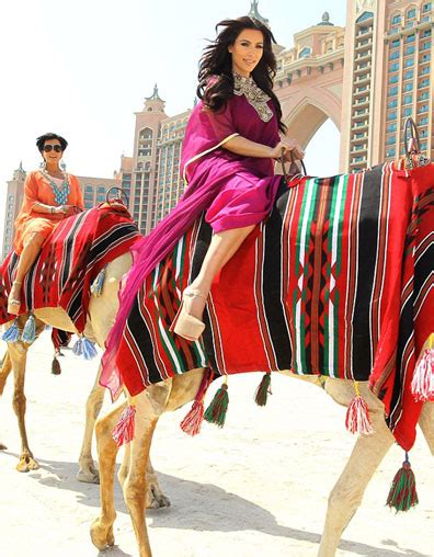This is what arab and pakistani traditions are all about; Kim Kardashian wears six-inch stilettos for camel ride ...