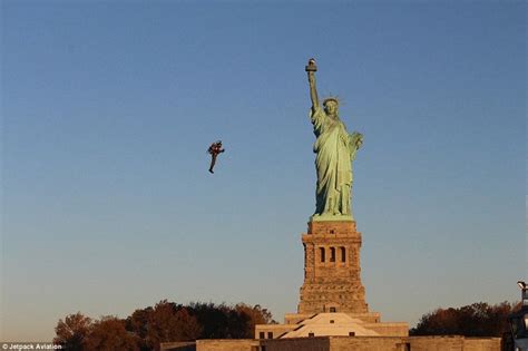 jetpack inventor flies his homemade craft around the statue of liberty statue of liberty