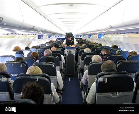 Passengers On A Aeroplane Stock Photo Alamy