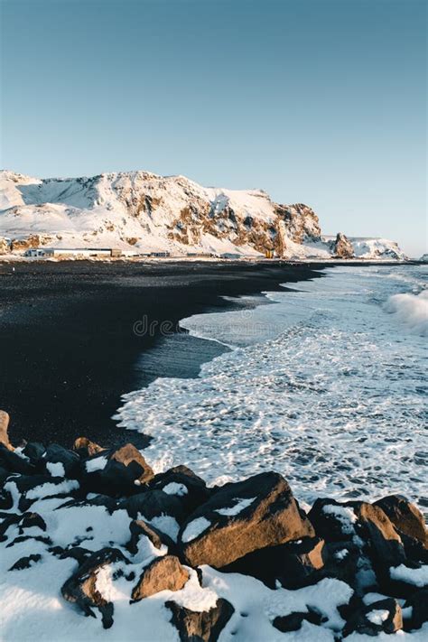 Well Known Black Sand Beach In Town Of Vik In Iceland During The Winter