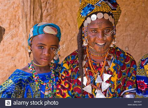 Two Girls In Southwestern Niger Dress Up In Their Finest Clothing And