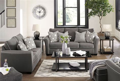 Living rooms in grey and yellow are very lively, refreshing and raise the mood because yellow reminds of the spring and summer, which is especially charcoal grey sofa and chair, yellow pillows and art pieces. #livingroomdecor | Charcoal living rooms, Budget friendly ...