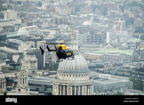 London Metropolitan Police Helicopter In Front Of St Pauls Cathedral