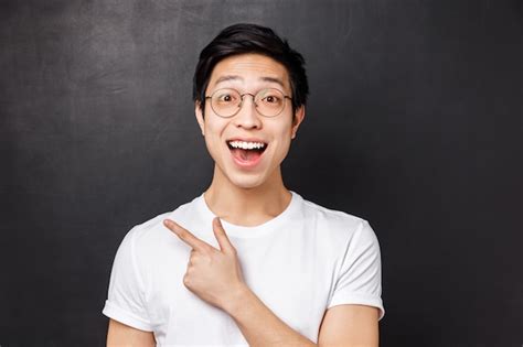 Free Photo Full Length Of Amazed And Impressed Attractive Asian Guy