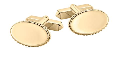 Plain Oval Yellow Gold Cufflinks Mappin And Webb The Jewellery Editor