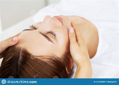 Beautiful Young Woman Relaxing With Hand Massage At Beauty Spa Salon Stock Image Image Of