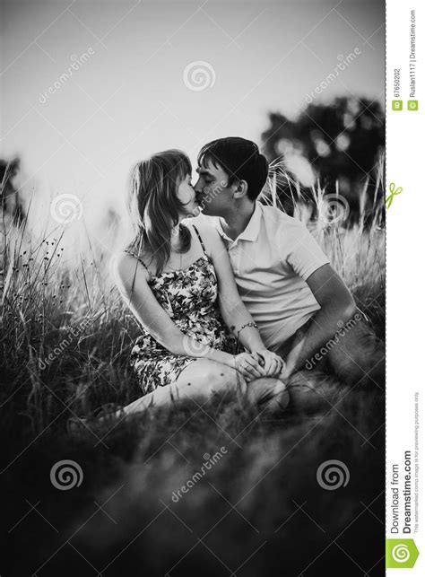 Black White Photography Romantic Couple Standing And Kissing On