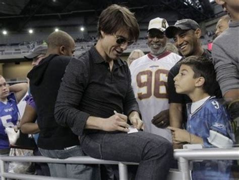 tom cruise attends detroit lions game  visiting son connor  red