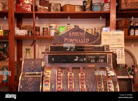 Old, antique cash register in a vintage apothecary shop in Yukon Stock