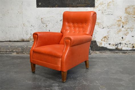This is the best office desk chair you will ever see. Vintage Swedish Orange Leather Lounge Chair at 1stdibs