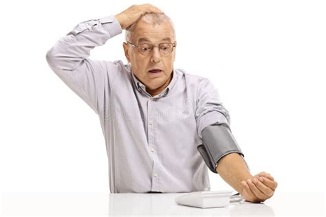 Shocked Mature Man Taking Blood Pressure Measurment Stock Photo Image