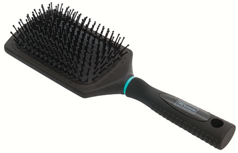 Grab this paddle hair brush whose bright square paddle is made of 100% natural bamboo and features curly nylon pins. Paddle Brush: What It Is and Why You Need It | All Things ...