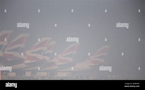 British Airways Planes On The Apron At Heathrow Airport As Number Of