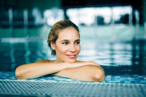 Portrait Of Beautiful Woman Relaxing In Swimming Pool Swimming Pool